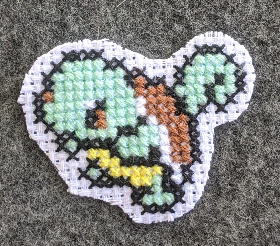 cross stitch of squirtle from pokemon